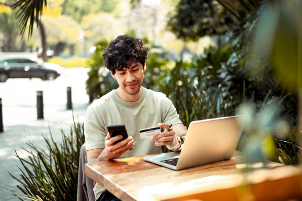 A man enjoys an outdoor cafe, emphasizing a modern, relaxed lifestyle contrary to common Dubai myths.