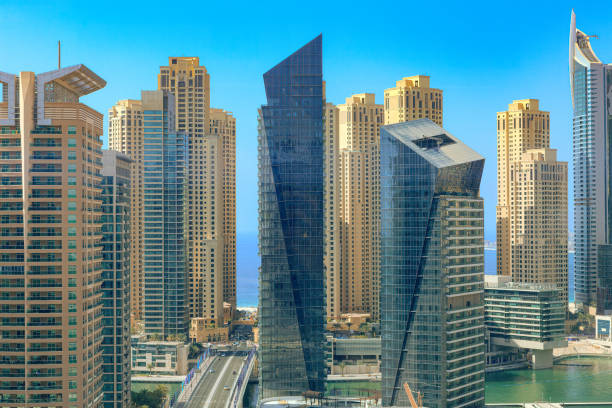 Modern skyscrapers in Dubai showcasing urban development and architecture, debunking myths about life in the city.